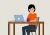 vrouw zit aan bureau achter haar laptop